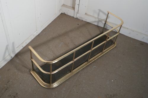 A Victorian Brass Club Fender