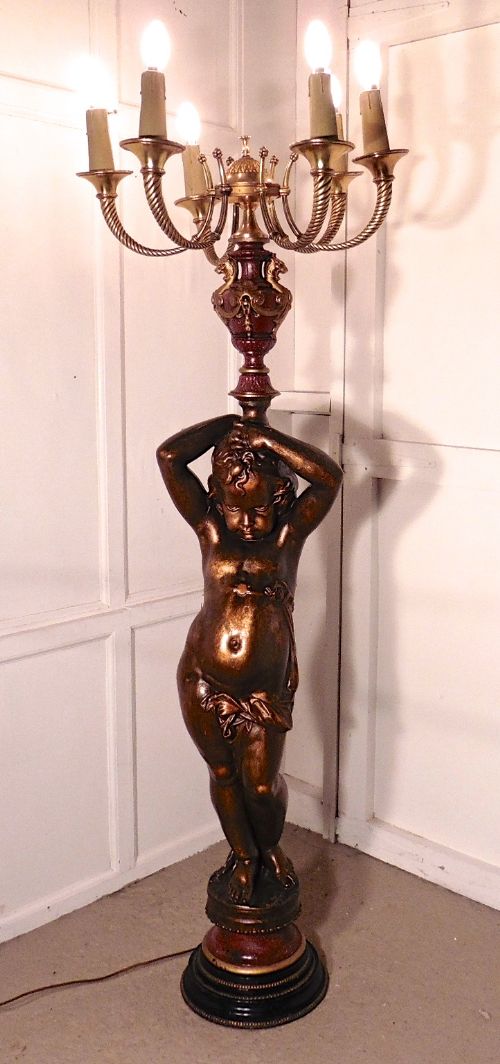 A Large Magnificent French Bronze Cherub Blackamoor Lamp