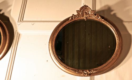 fig 3. A Rare Pair of 19th Century Regency Style Oval Gilt Mirrors