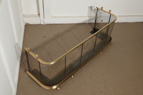 fig 3. A Victorian Brass and Iron Club Fender