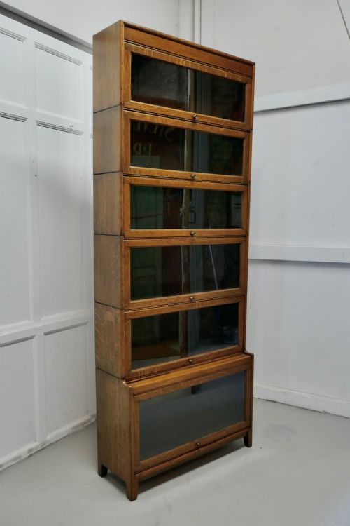 A Tall Art Deco Golden Oak Barrister Waterfall Bookcase, Made by Gumm