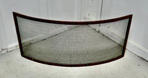 fig 1. Victorian Arts and Crafts Beaten Copper Curved Spark Screen fire guard