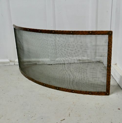 fig 2. Victorian Arts and Crafts Beaten Copper Curved Spark Screen fire guard
