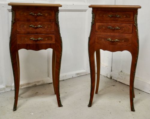 A Pair of Inlaid French Marquetry Bombe Shaped Bedside Cupboards