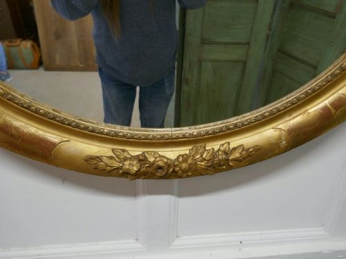 fig 1. A Large French Rococo Oval Gilt Wall Mirror