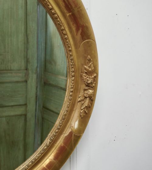 fig 2. A Large French Rococo Oval Gilt Wall Mirror