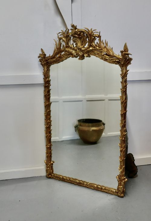 fig 1. A Large Elaborate French Rococo Gilt Console Mirror Decorated with Leaves and Birds