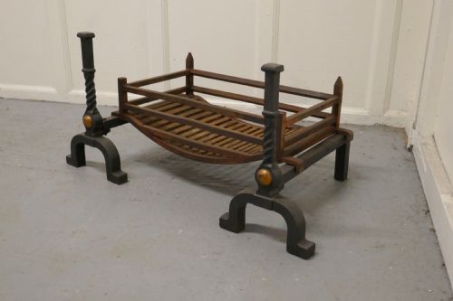fig 2. A Large Inglenook Fire Grate with Andirons