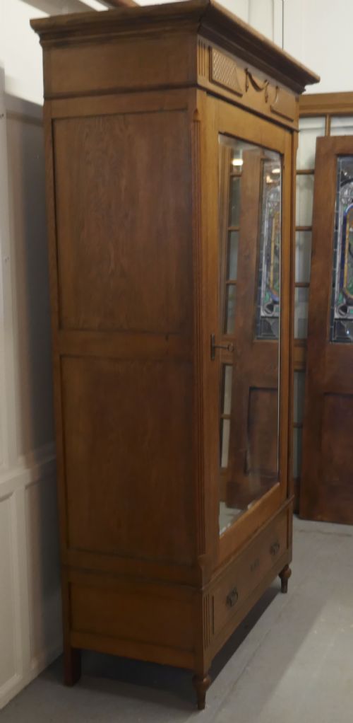 fig 1. A Victorian Arts and Crafts Golden Oak Mirrored Wardrobe