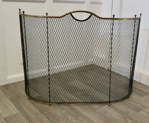 A Victorian Curved Brass and Iron Nursery Fire Guard