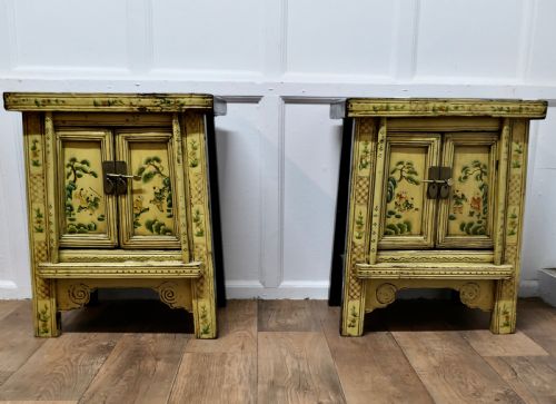A Superb Pair of Cream Lacquered Chinoiserie Decorated Cabinets.