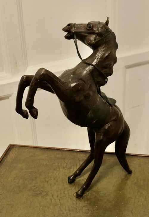 ARTS AND CRAFTS LEATHER MODEL OF A HORSE - ADDITIONAL PHOTO 1