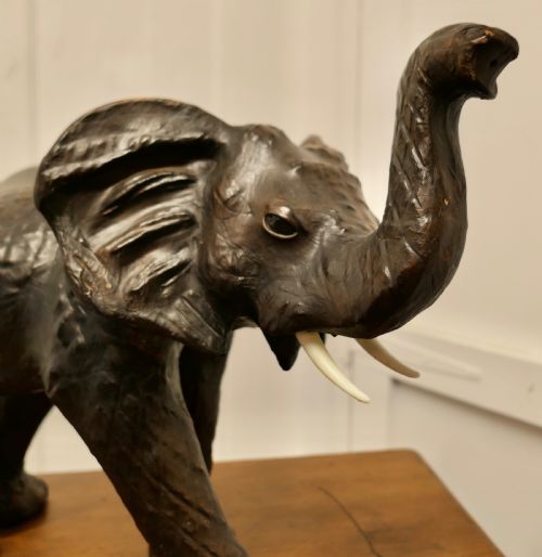 ARTS AND CRAFTS LEATHER MODEL OF AN ELEPHANT - ADDITIONAL PHOTO 1