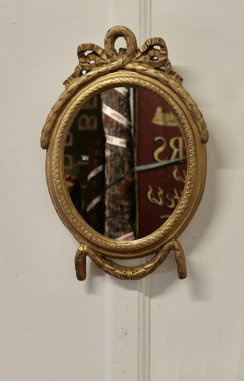 DECORATIVE GILT OVAL MIRROR - ADDITIONAL PHOTO 4