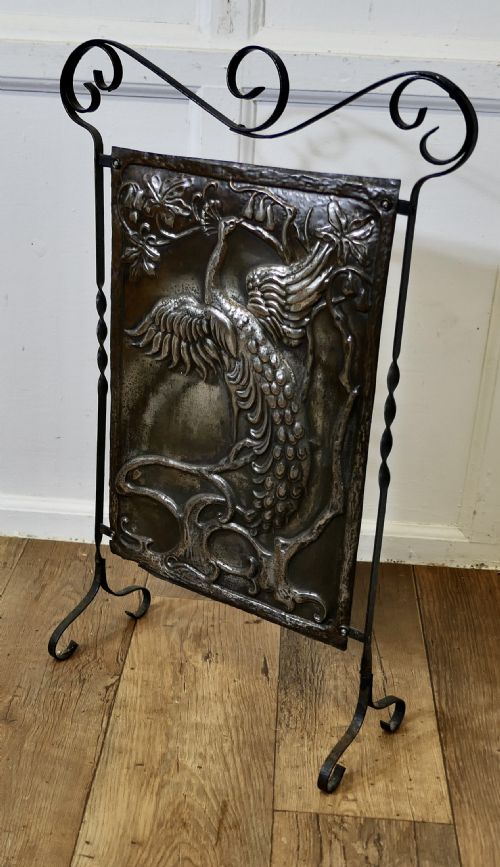 ARTS AND CRAFTS PEACOCK POLISHED IRON FIRE SCREEN - ADDITIONAL PHOTO 1
