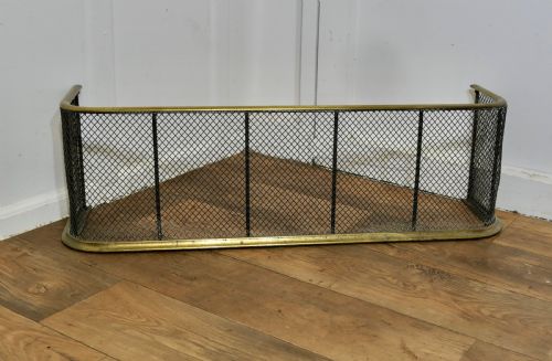 A Victorian Brass and Iron Fender or Fire Guard