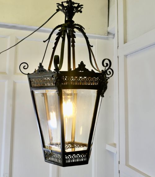 AN OLD DECORATIVE GREEN MAN COPPER LANTERN - ADDITIONAL PHOTO 1