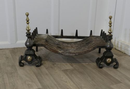 LARGE POLISHED STEEL AND BRASS LOG GRATE ON ANDIRONS