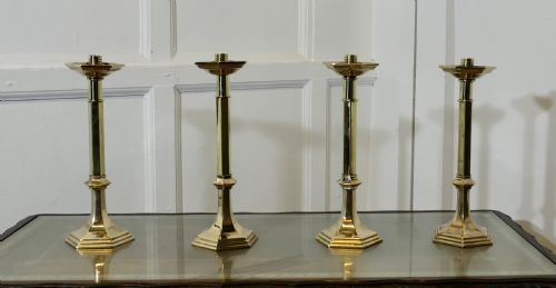 Four Arts and Crafts Brass Candle Sticks
