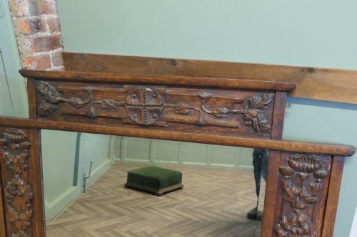 A LARGE ARTS AND CRAFTS CARVED OAK OVERMANTEL OR WALL MIRROR - ADDITIONAL PHOTO 2