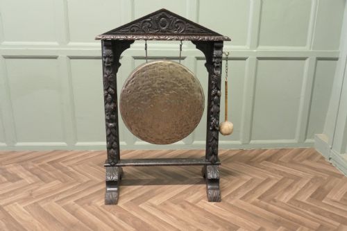 A Large Gothic Carved Oak and Brass Dinner Gong