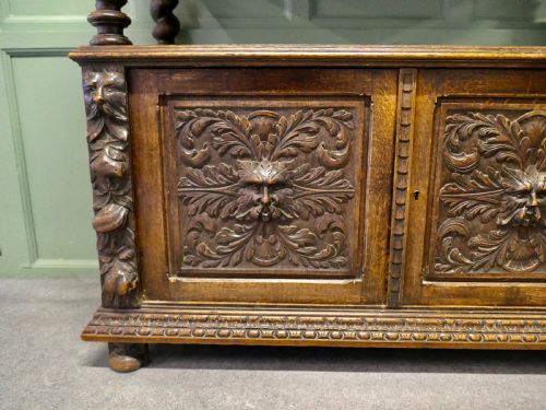 A SUPERBLY CARVED GREEN MAN OAK SIDE BOARD OR BUFFET - ADDITIONAL PHOTO 1