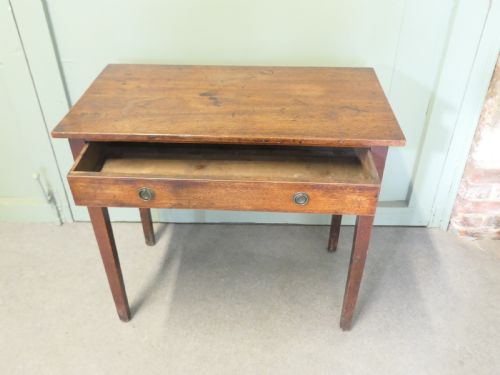 AN EARLY 19TH CENTURY OAK WRITING TABLE - ADDITIONAL PHOTO 1