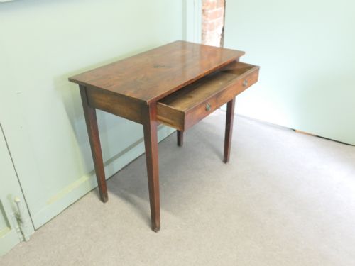 AN EARLY 19TH CENTURY OAK WRITING TABLE - ADDITIONAL PHOTO 2
