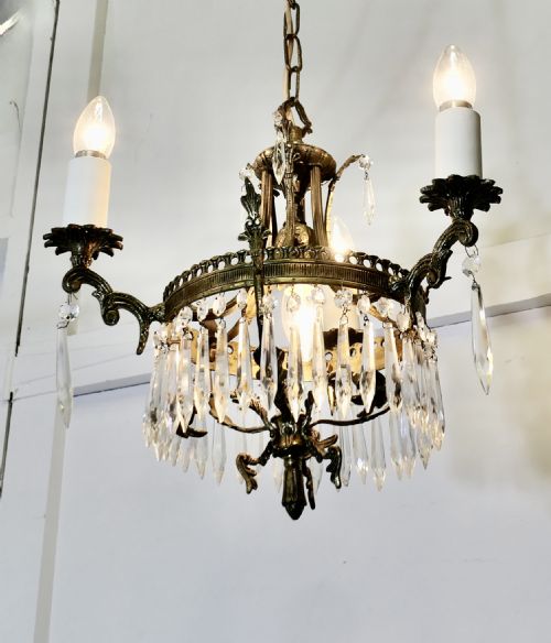 A STUNNING 3 BRANCH BRASS AND CRYSTAL CHANDELIER - ADDITIONAL PHOTO 1