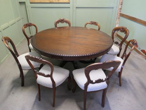 LARGE CENTRE DINING TABLE AND 8 CHAIRS