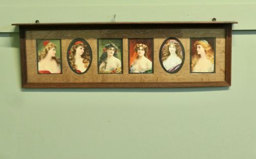 6 PRERAPHAELITE PORTRAITS MOUNTED IN AN OAK SHELF