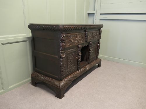 EARLY 19TH CENTURY OAK GREEN MAN DRESSER BASE