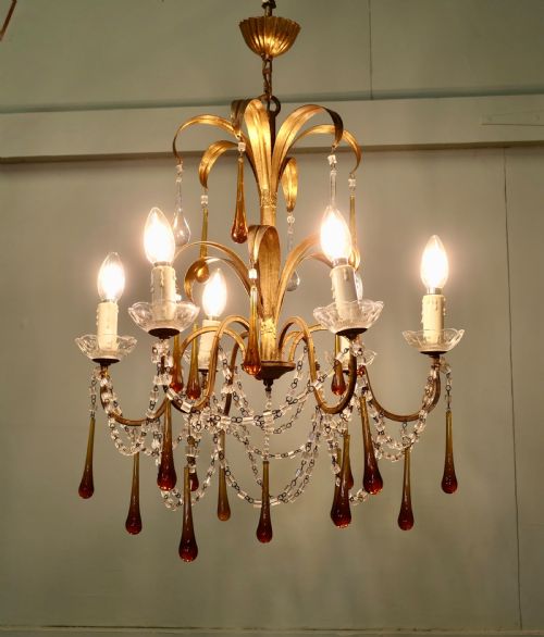 FRENCH GILT TOLEWEAR CHANDELIER HUNG WITH AMBER CRYSTAL TEARDROPS