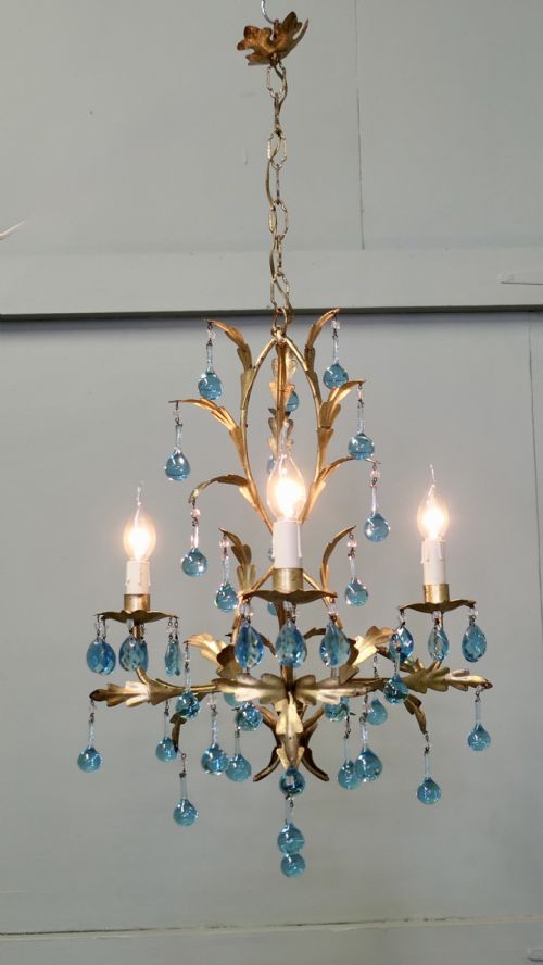 A CHARMING FRENCH TURQUOISE CRYSTAL AND TOLEWEAR CHANDELIER