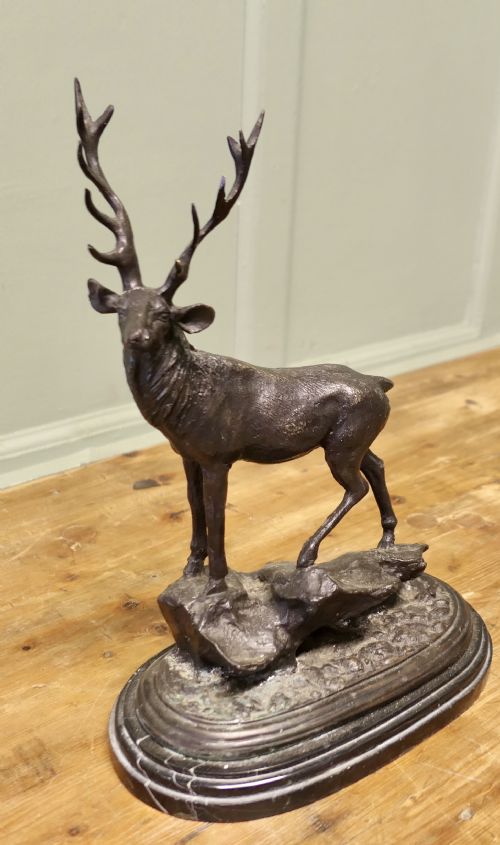 Signed Bronze Sculpture of a Stag Standing on a Rock Set on a Marble Plinth