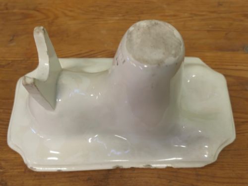 A Staffordshire Cream Glazed Lion Jelly Mould