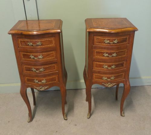 A Pair of Tall French Four Drawer Ormolu Side Lockers
