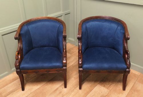 A Pair of Victorian Upholstered Tub Chairs with Swans