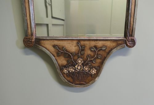 fig 1. A 19th-century Northern Italian Baroque style wall mirror featuring a carved wooden frame with a scallop shell crest and polychrome floral carvings.