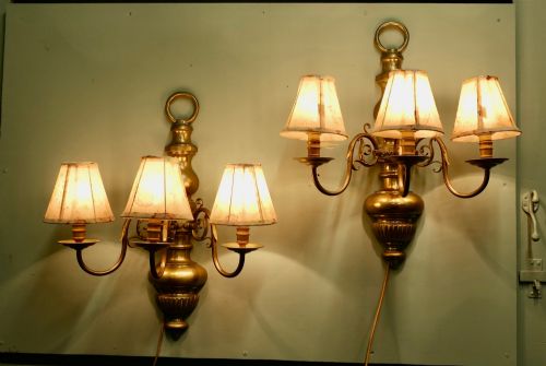 A Pair of Large French Arts and Crafts Brass Wall Lights