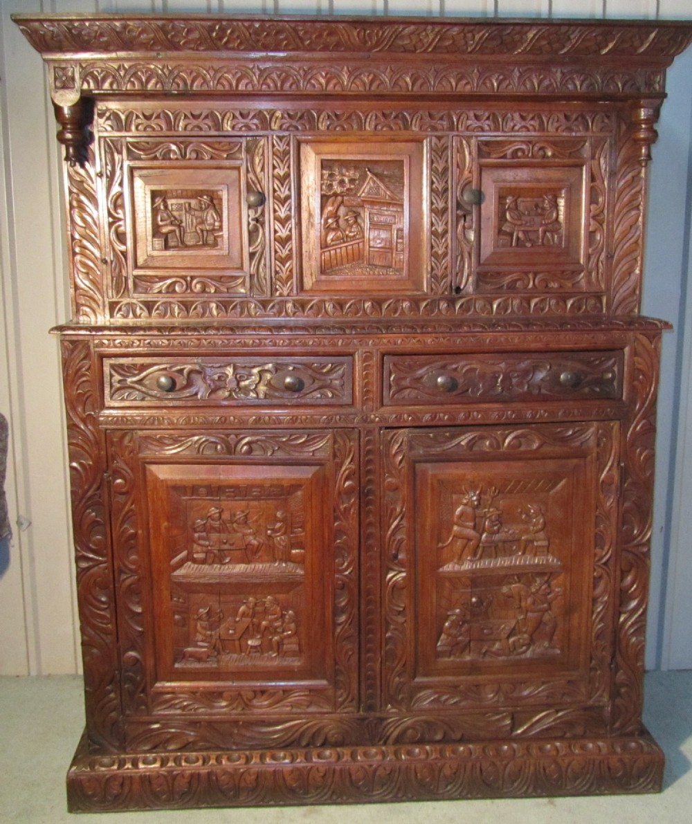 A Very Unusual 19th Century Green Man Carved Oak Court Cupboard 