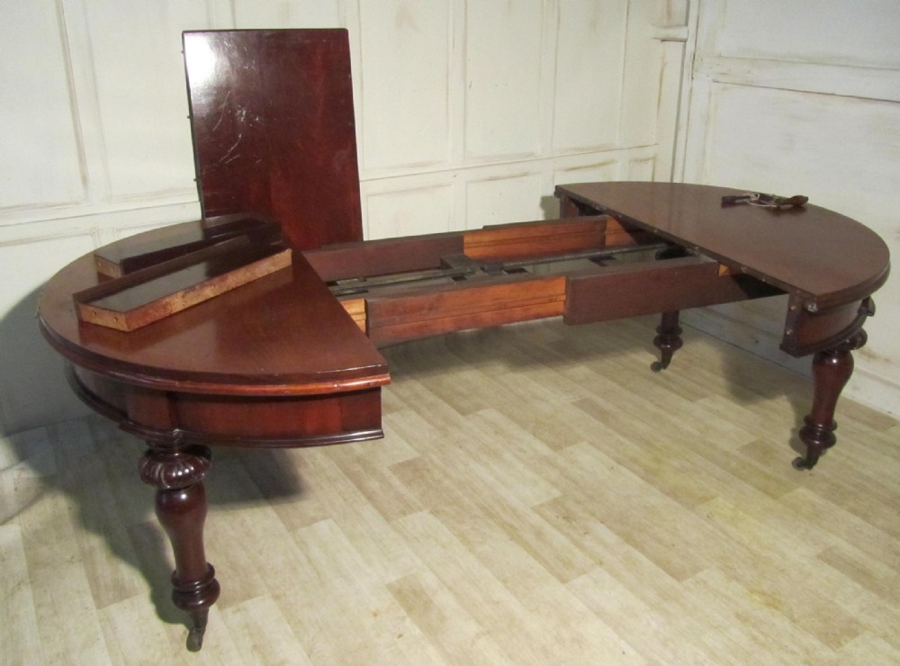 Early Victorian Oval Wind Out Mahogany Table