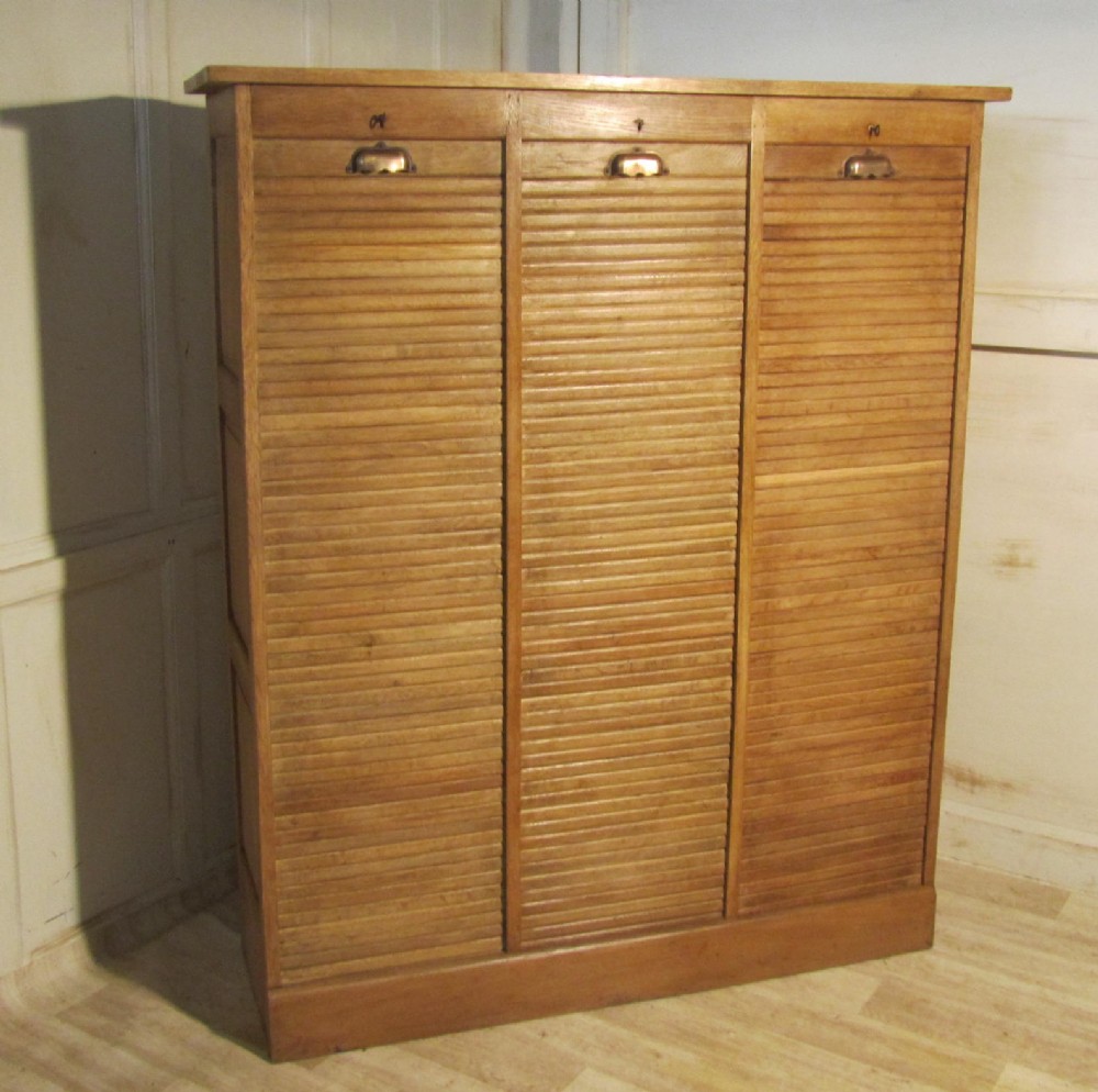 A Large French Tambour Triple Fronted Bleached Oak Art Deco Filing Cabinet