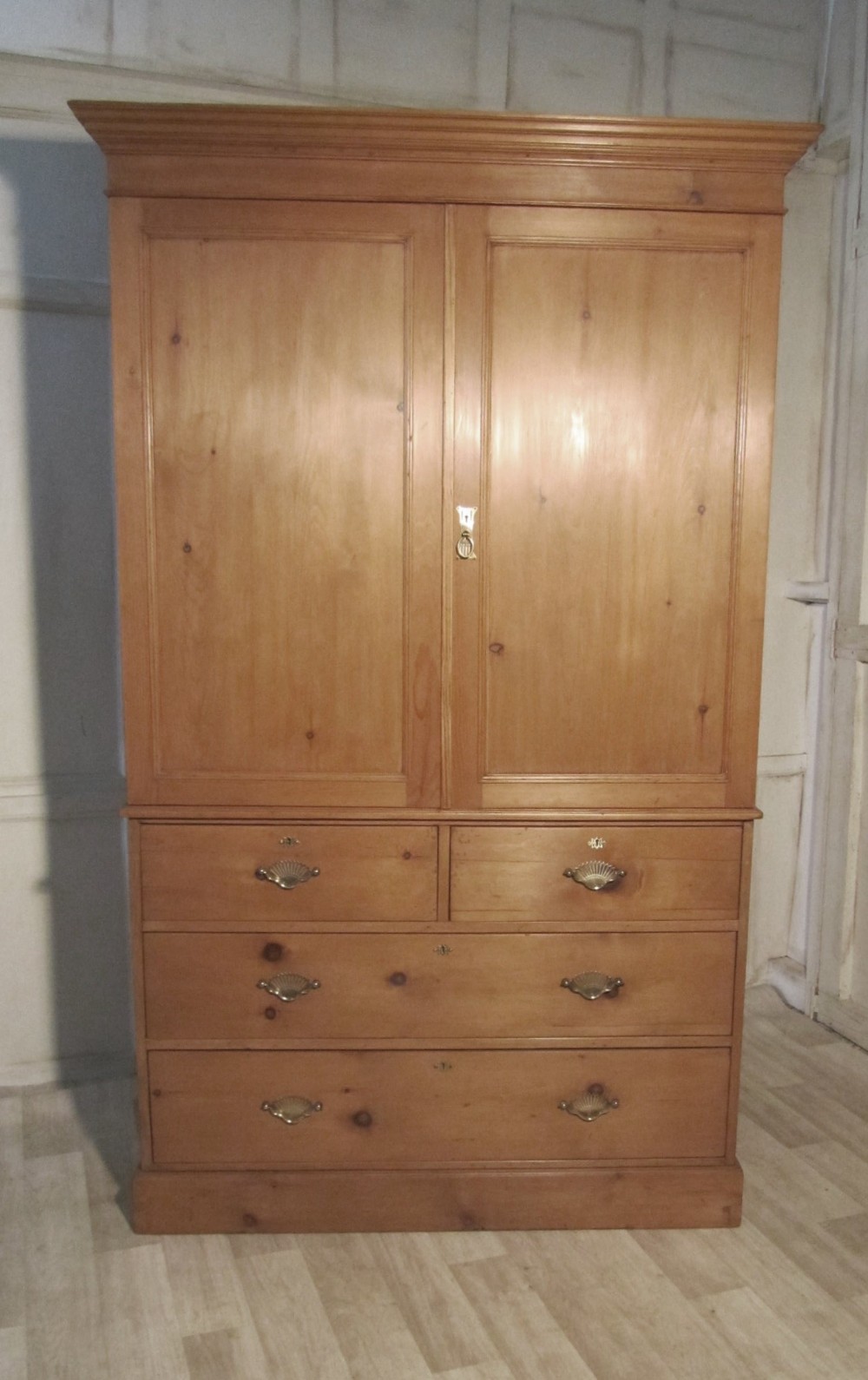 A Victorian Pine Linen Press or Housekeeper’s Cupboard
