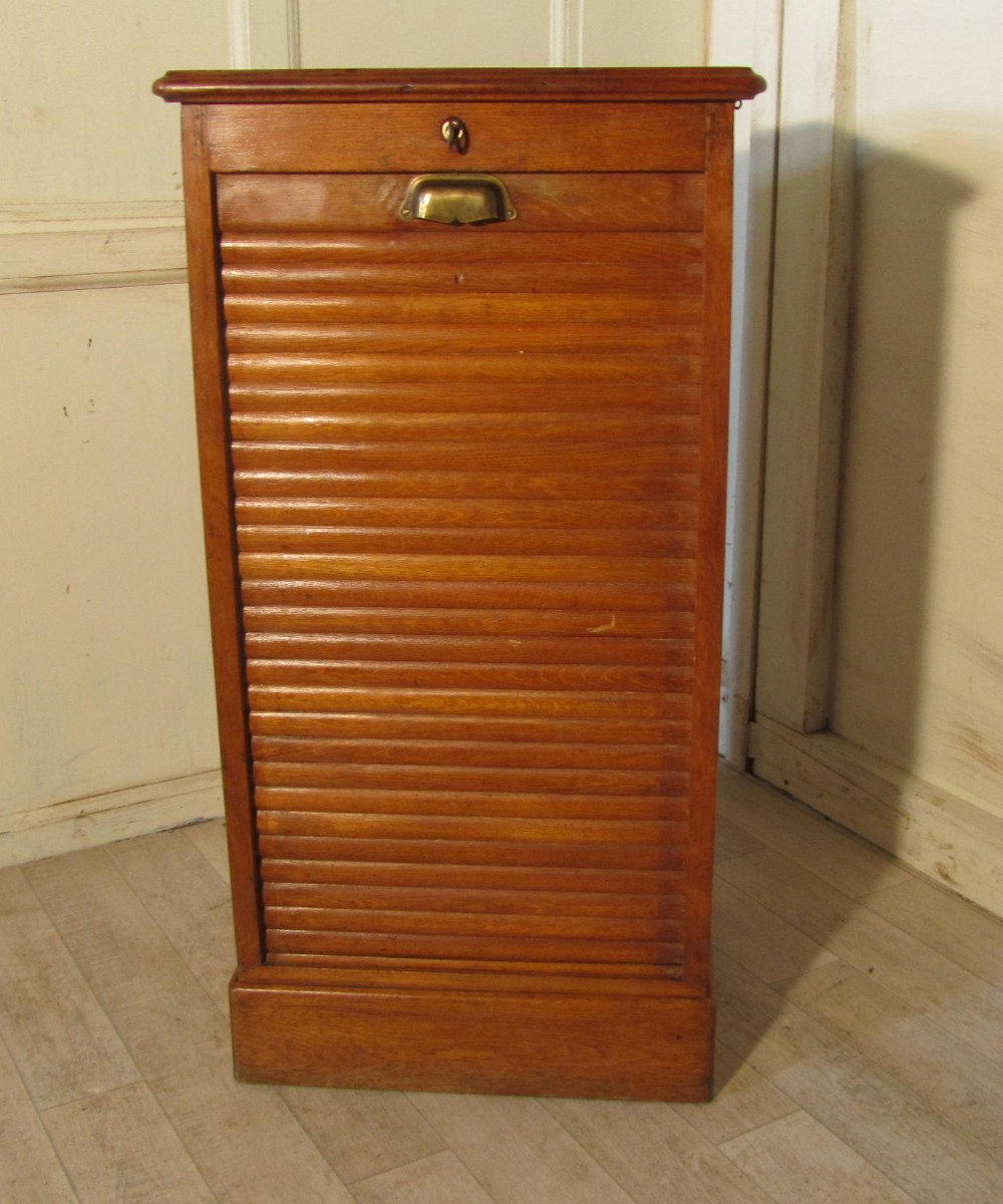 A French Tambour Fronted Oak Art Deco Filing Cabinet