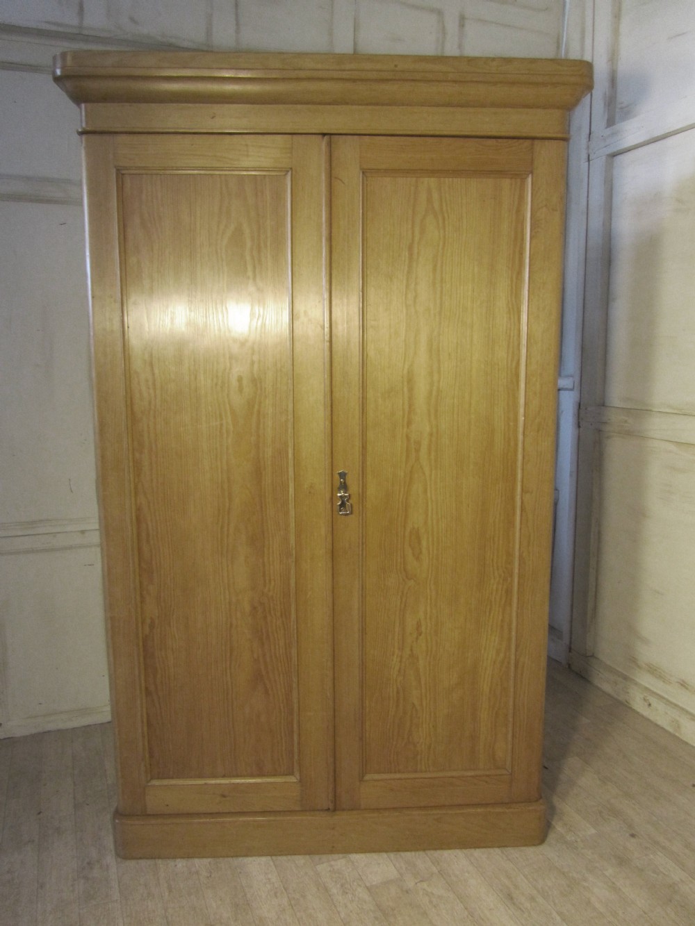 A Victorian Stripped Pine Wardrobe Compactum