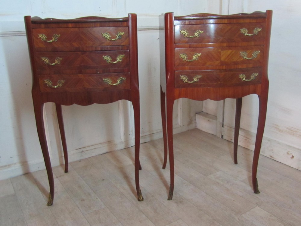 A Pair of Inlaid French Serpentine Bedside Cupboards