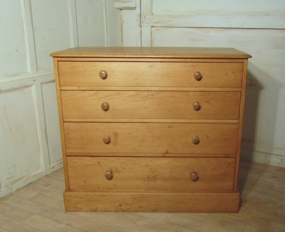 A  large Victorian Stripped Pine Chest of Drawers