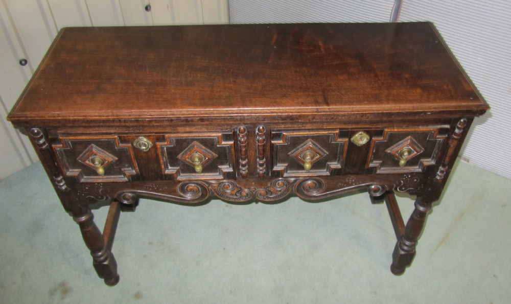 An Early Victorian Oak Cottage size Carved Dresser Base