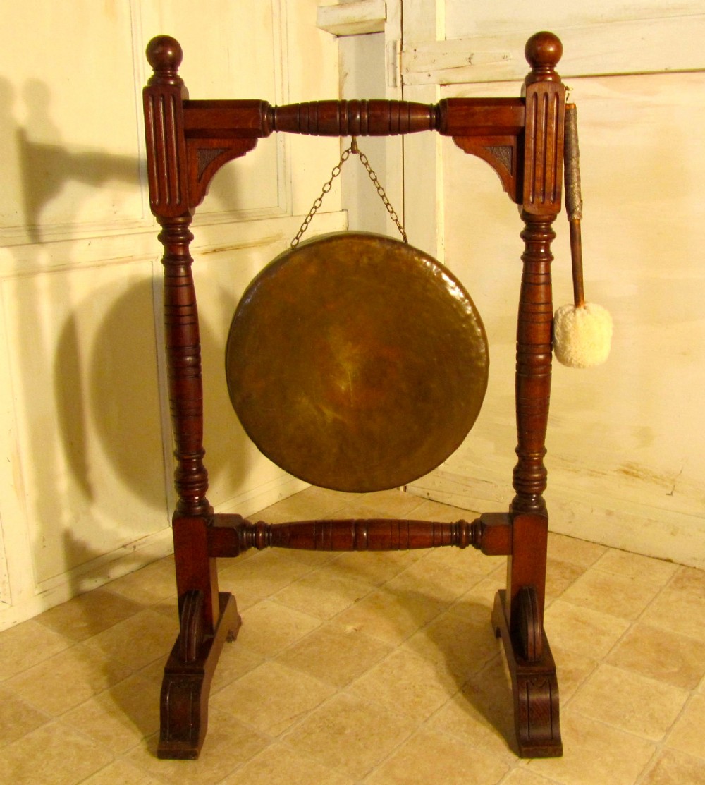 A Large Arts and Crafts Oak & Brass Dinner Gong